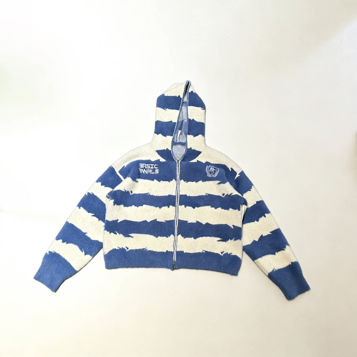 Blue and white striped hooded zip sweater, flat lay front view