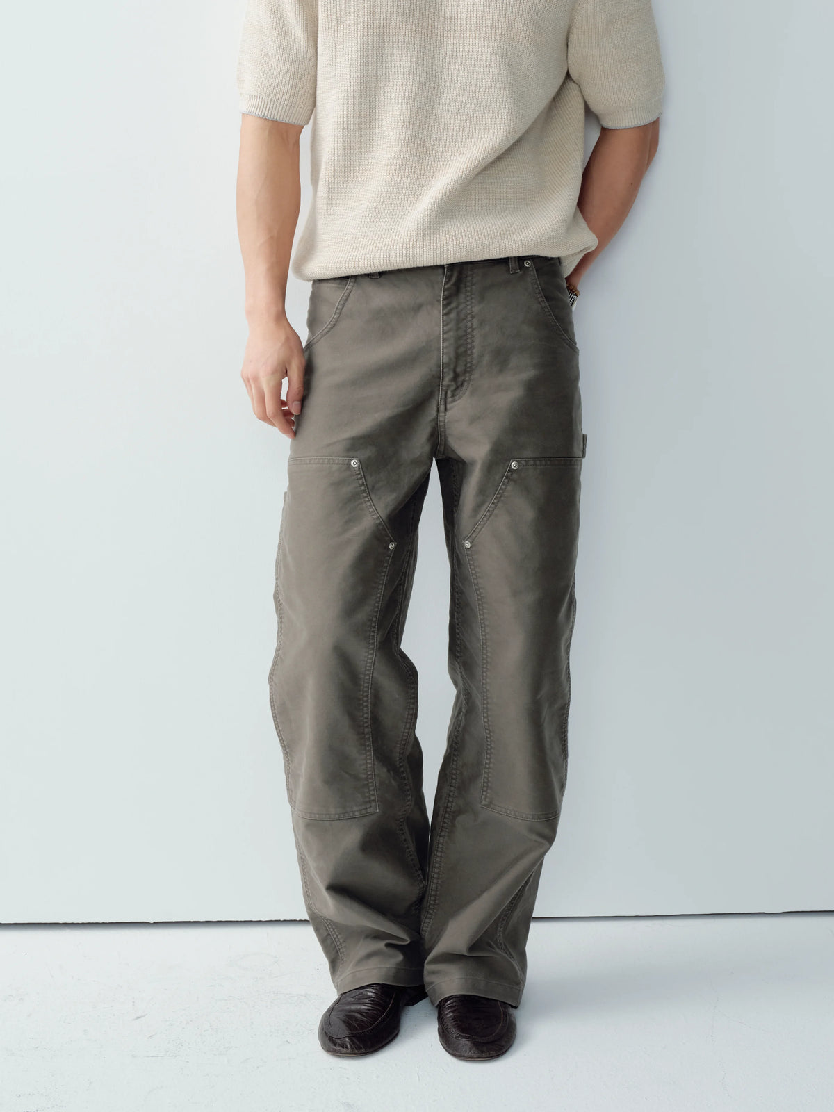 Model wearing taupe cotton moleskin double-knee pants