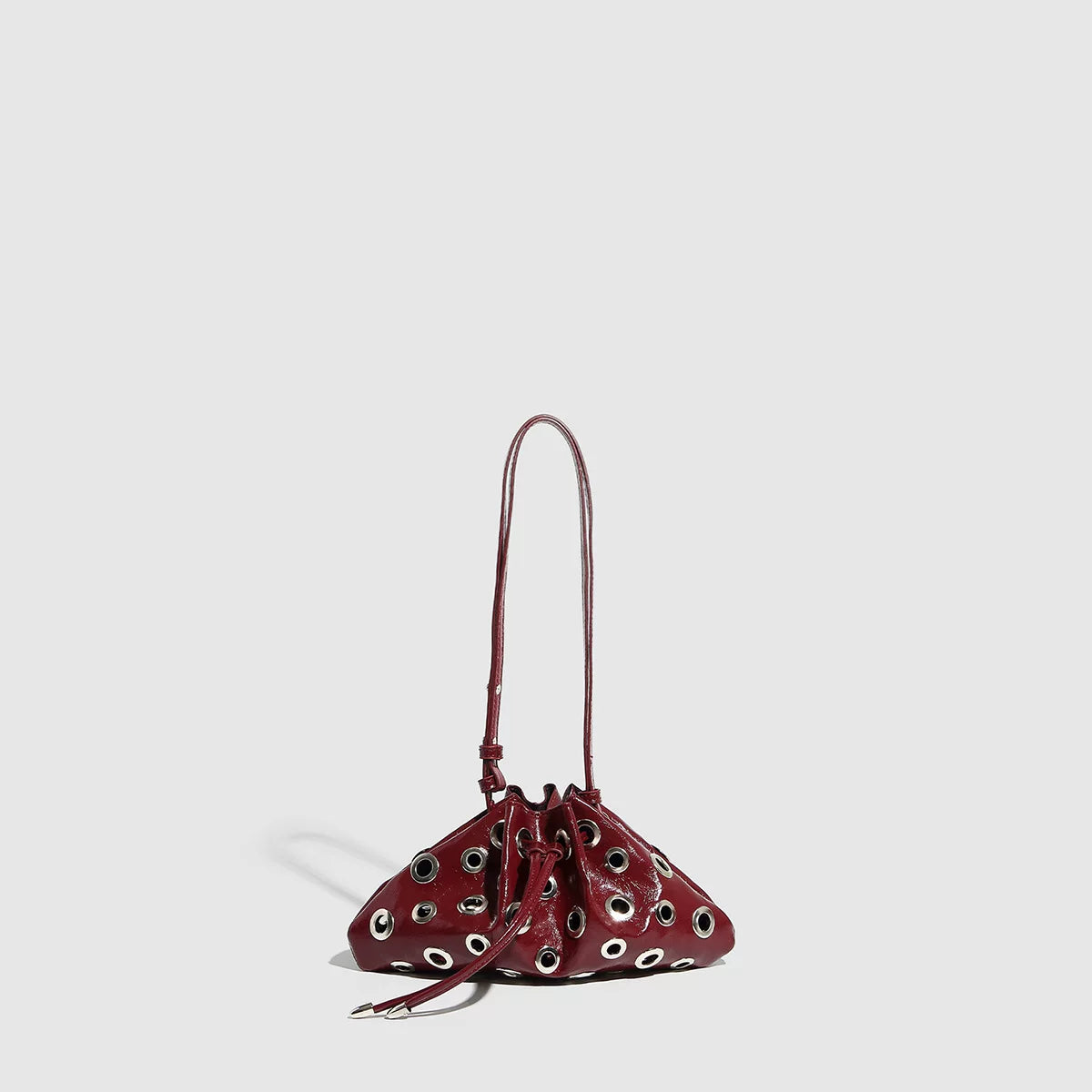 Eyelet Studded Drawstring Shoulder Bag product photo