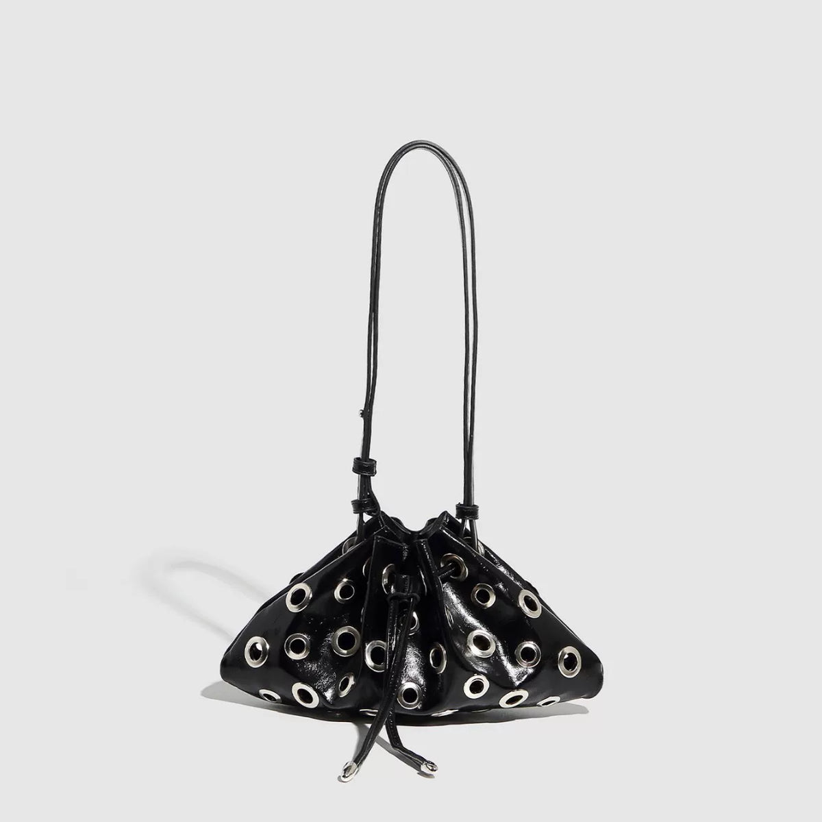 Eyelet Studded Drawstring Shoulder Bag product photo