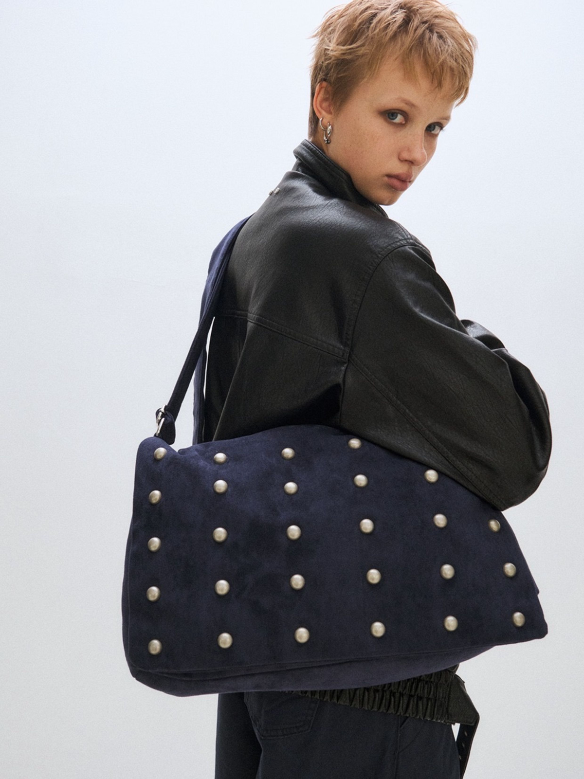 Studded Wide Strap Large Capacity Shoulder Bag in navy worn on the shoulder