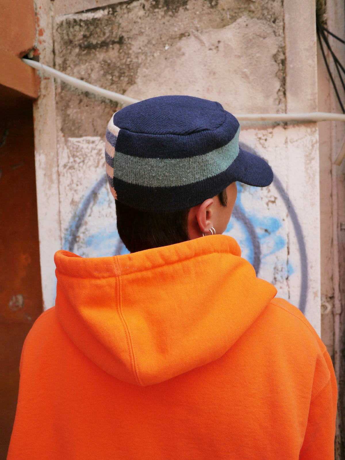 Embroidered Curved-Brim Knit Cap in Navy and Brown color