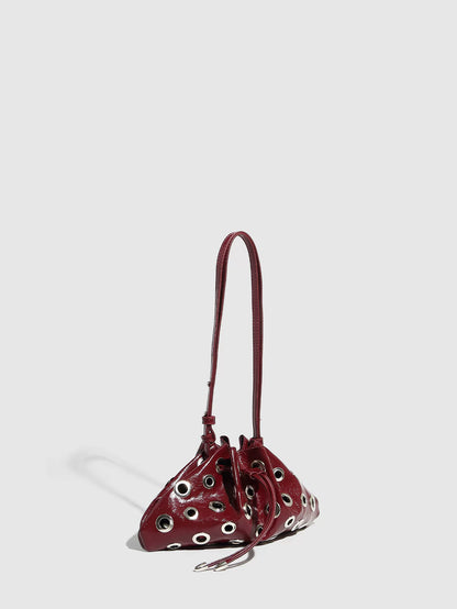 Eyelet Studded Drawstring Shoulder Bag product photo