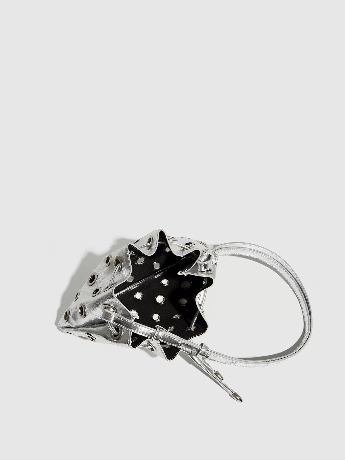 Eyelet Studded Drawstring Shoulder Bag product photo