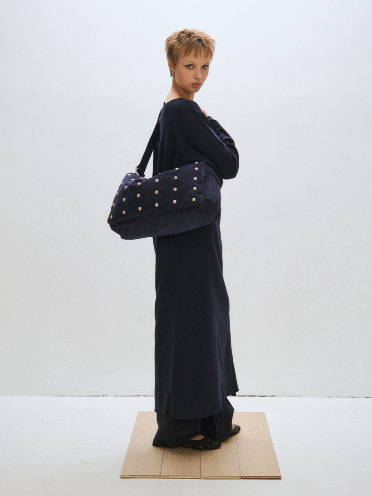 Studded Wide Strap Large Capacity Shoulder Bag in navy on model