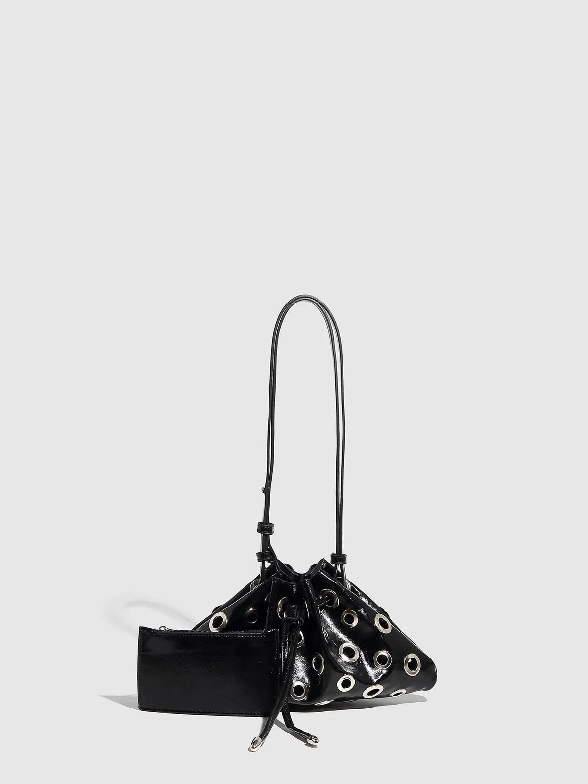 Eyelet Studded Drawstring Shoulder Bag product photo