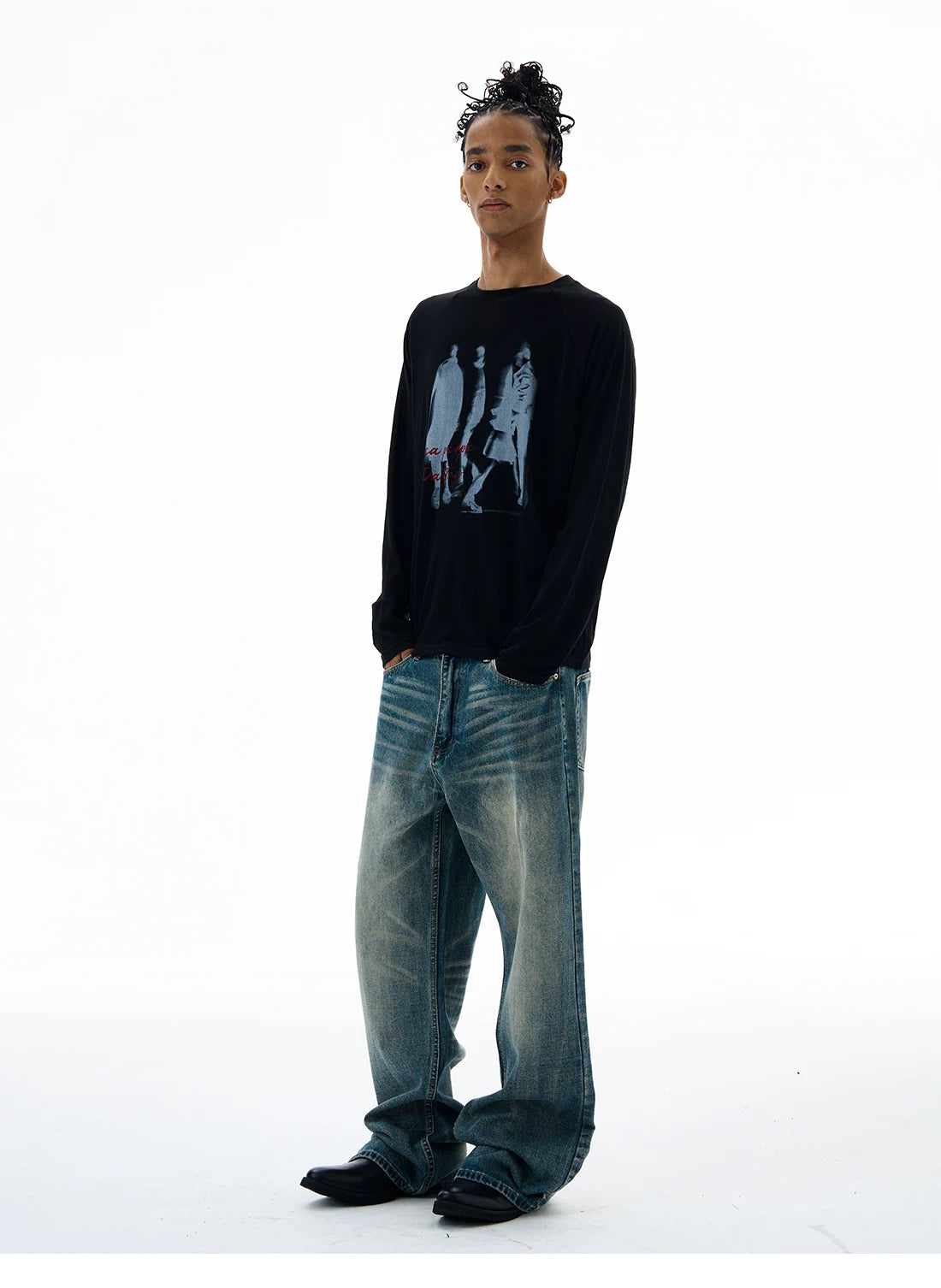 Black graphic T-shirt, side view