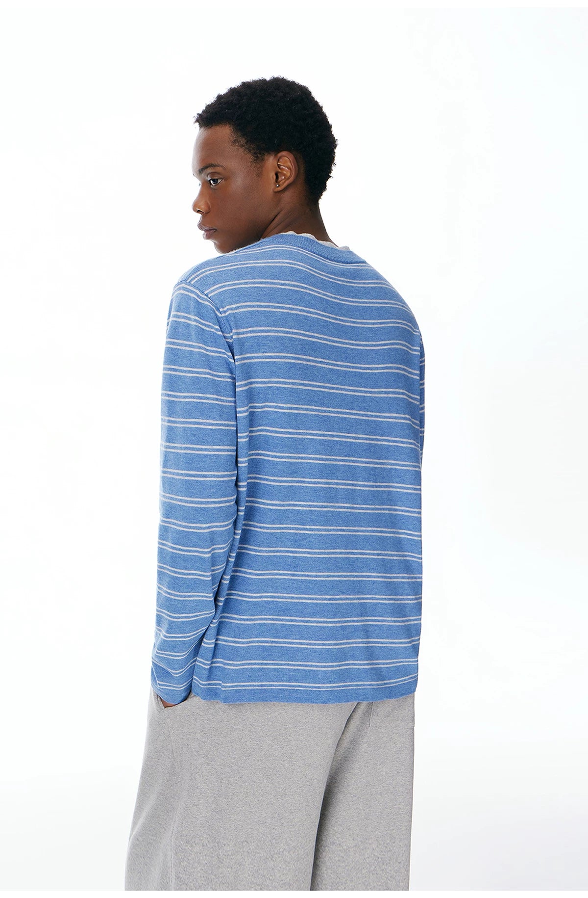 Back view of the blue striped Henley sweater