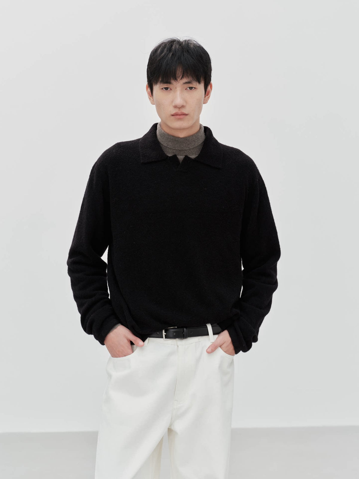 Black boucle polo sweater, front view