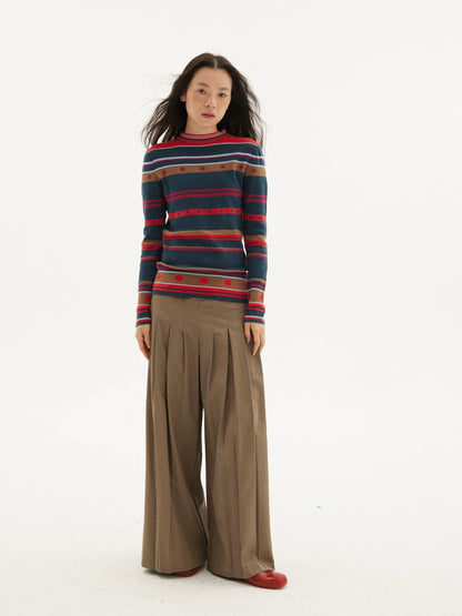 Striped knit sweater in navy, red and green, full view