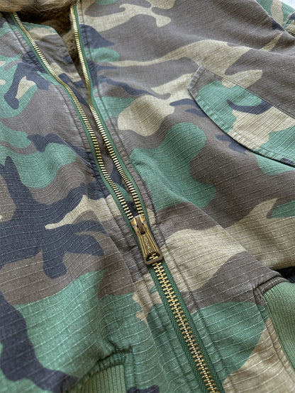 Close view of camouflage jacket zipper