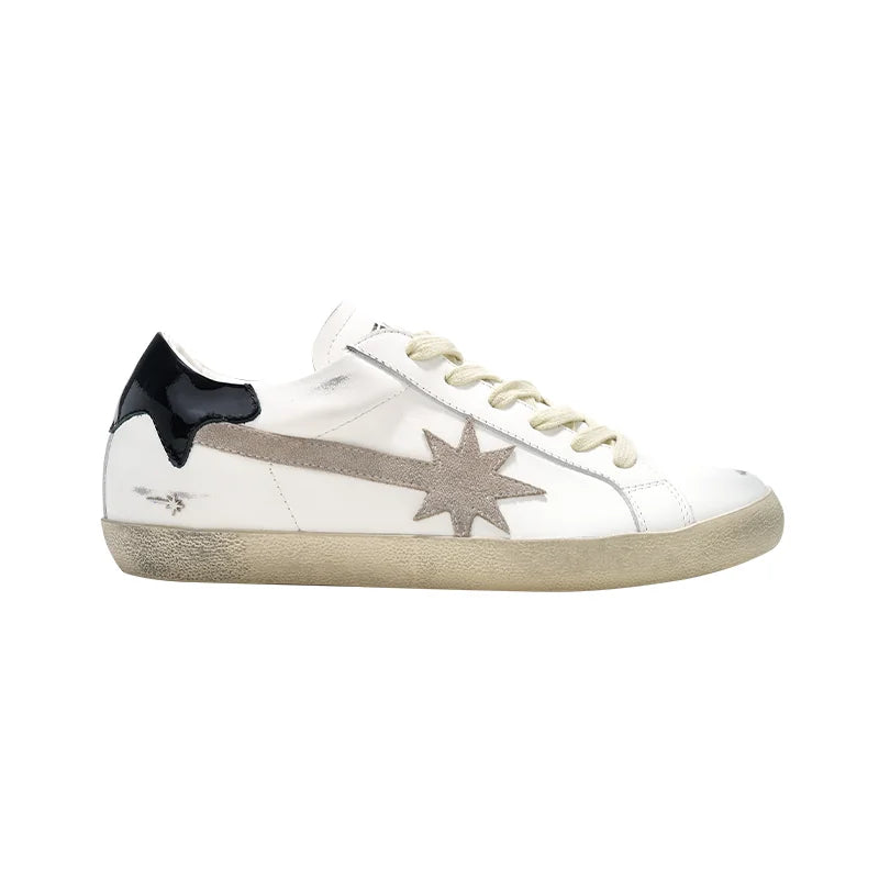 white hand-distressed Black-Tail Meteor flat shoes