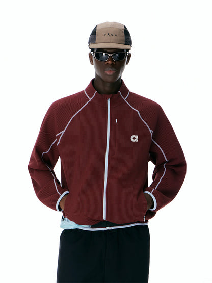 Burgundy waffle-knit zip track jacket, front view