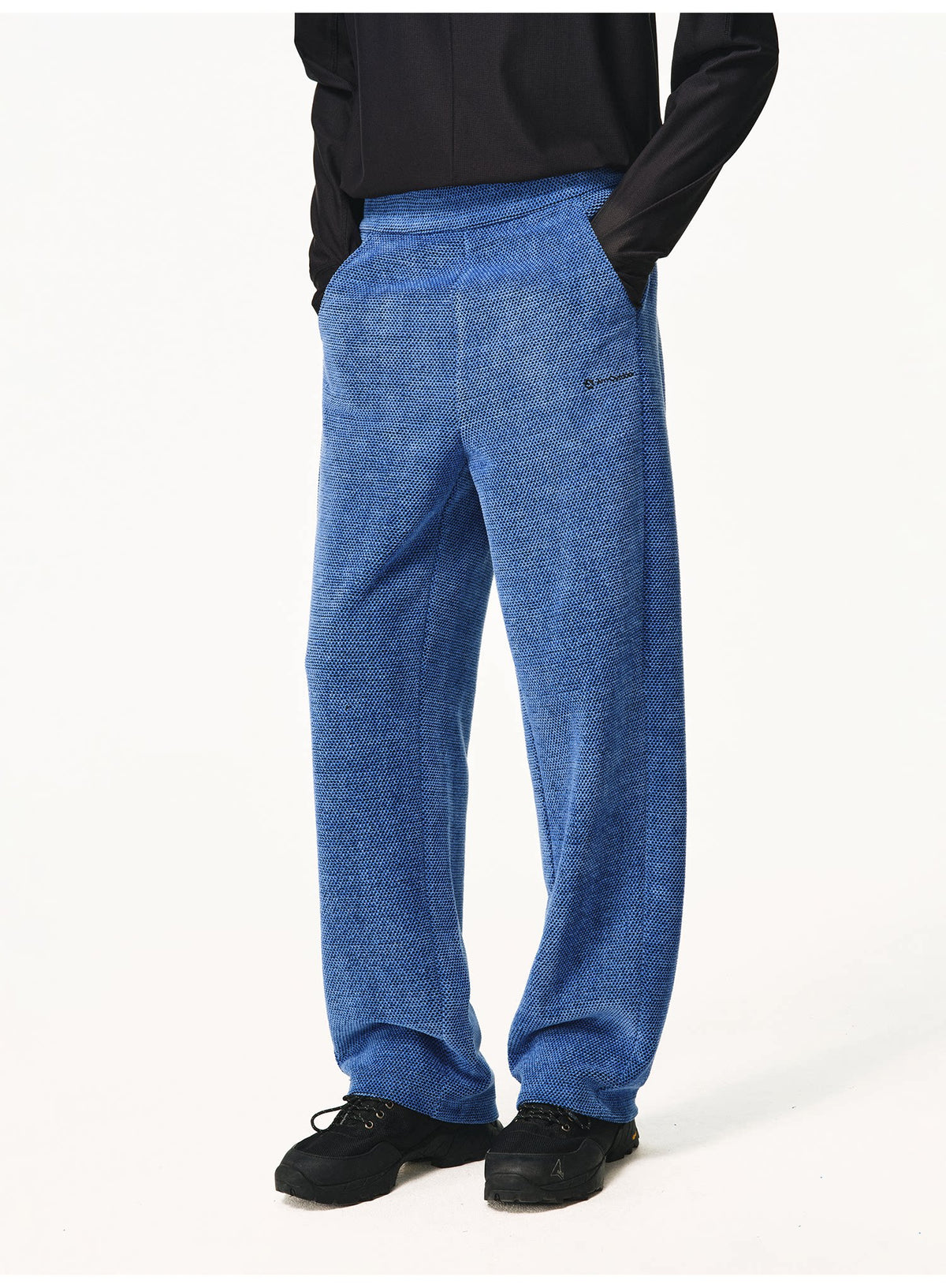 Angled view of the waffle-knit pants