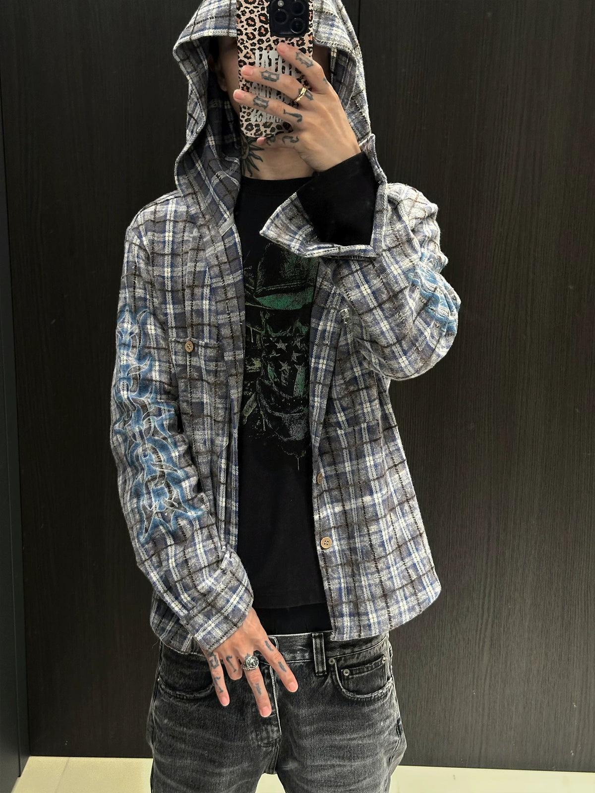 Blue-grey plaid hooded shirt, model front view