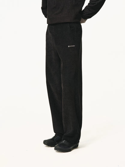 Black waffle-knit pants, front view