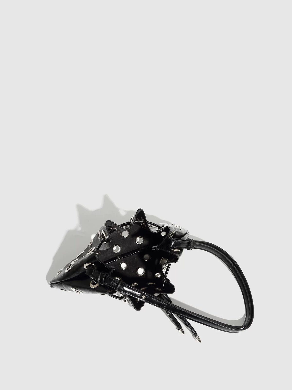 Eyelet Studded Drawstring Shoulder Bag product photo