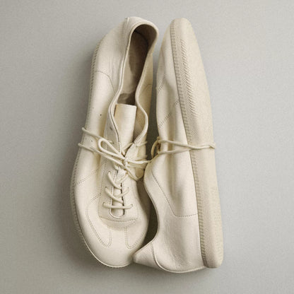 Achromate Leather Low-Profile Trainer Sneakers — cream pair, top and side views