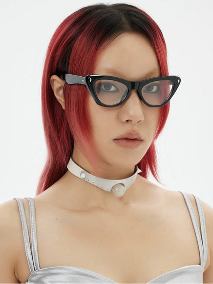 Black Triangular Cat-Eye Glasses — Model wearing black triangular cat-eye clear-lens glasses