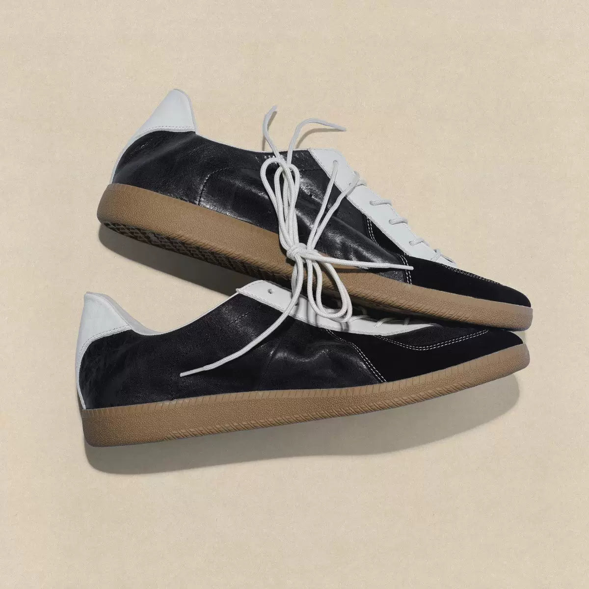 Black Vintage German Sneakers, angled pair