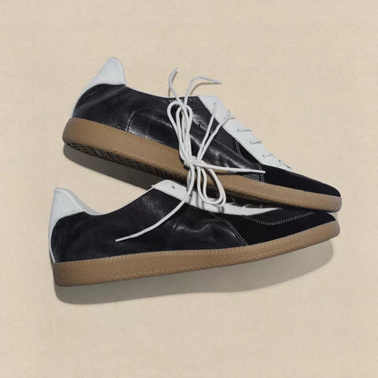 Black Vintage German Sneakers, angled pair