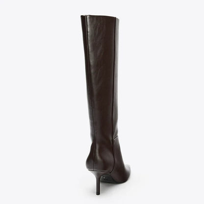 Brown knee-high boot, rear view showing the slim stiletto heel