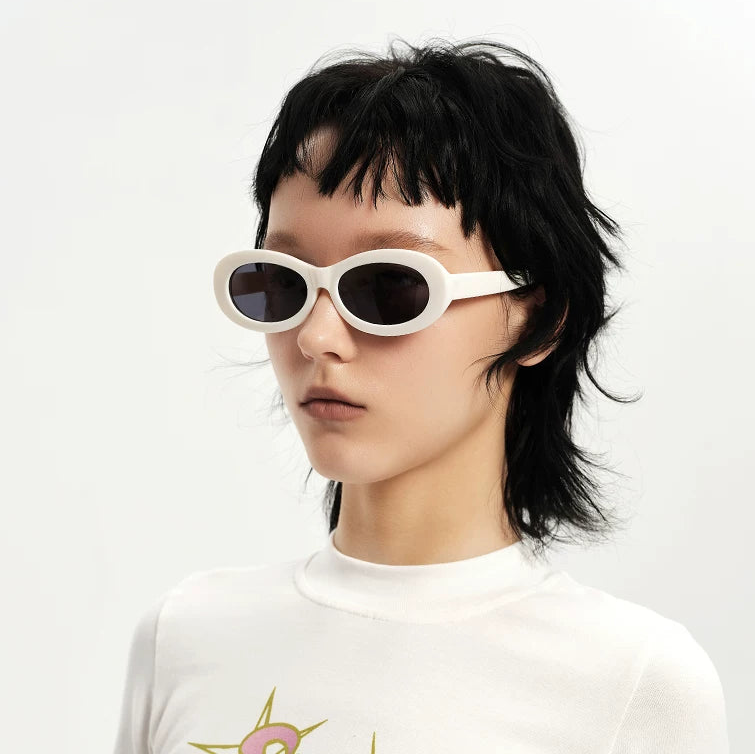 Chunky Oval Sunglasses — Model wearing white chunky oval sunglasses