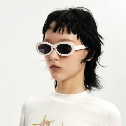 Chunky Oval Sunglasses — Model wearing white chunky oval sunglasses