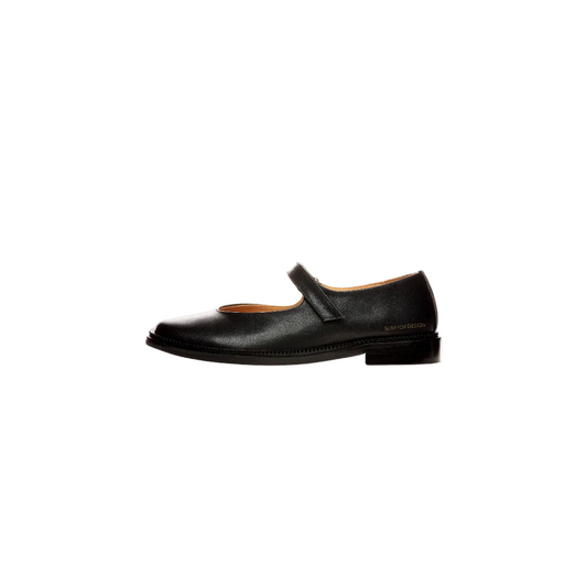Classic Black Mary Jane Flats — black shoe, side view