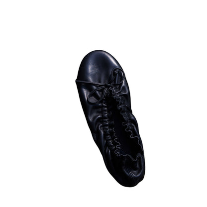 Crinkled Lambskin Folding Ballet Flats — black pair, top view