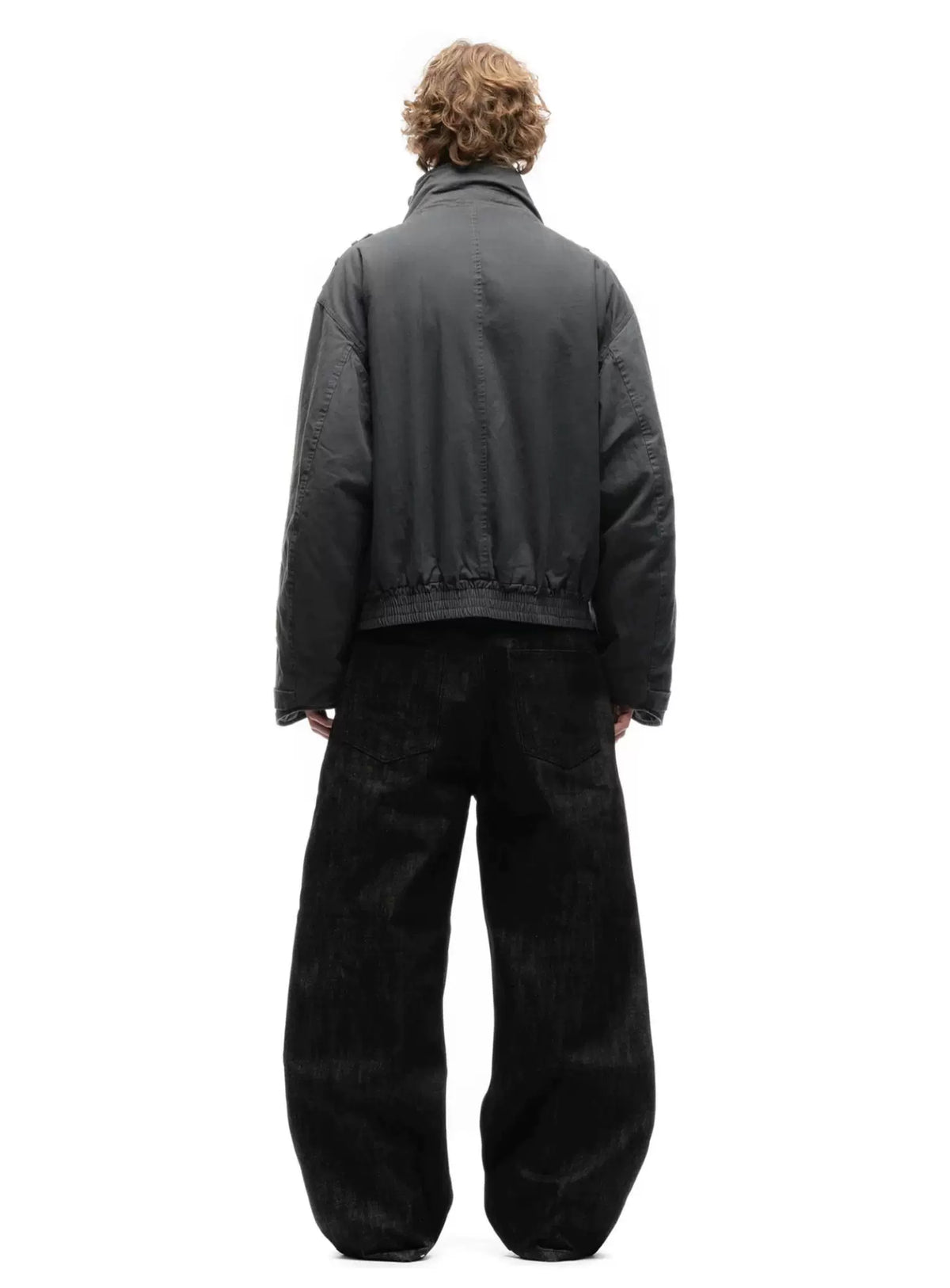 Cropped Parka Jacket — Model wearing grey jacket, back view