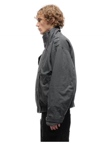 Cropped Parka Jacket — Model wearing grey jacket, left side view