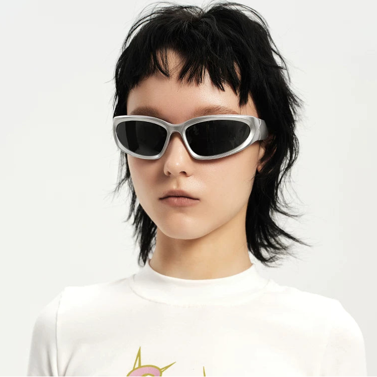 Cyberpunk Angular Sunglasses — Model wearing silver angular sunglasses