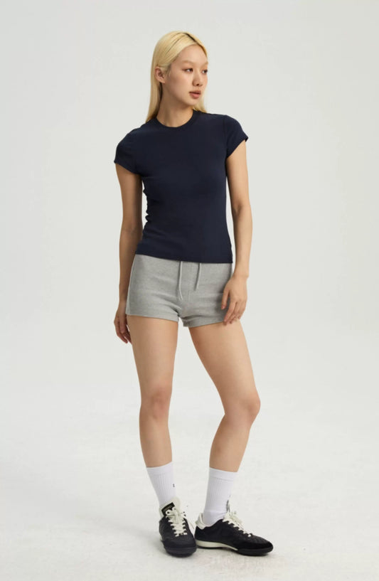 Slim-fit Basic Tee — worn by a model