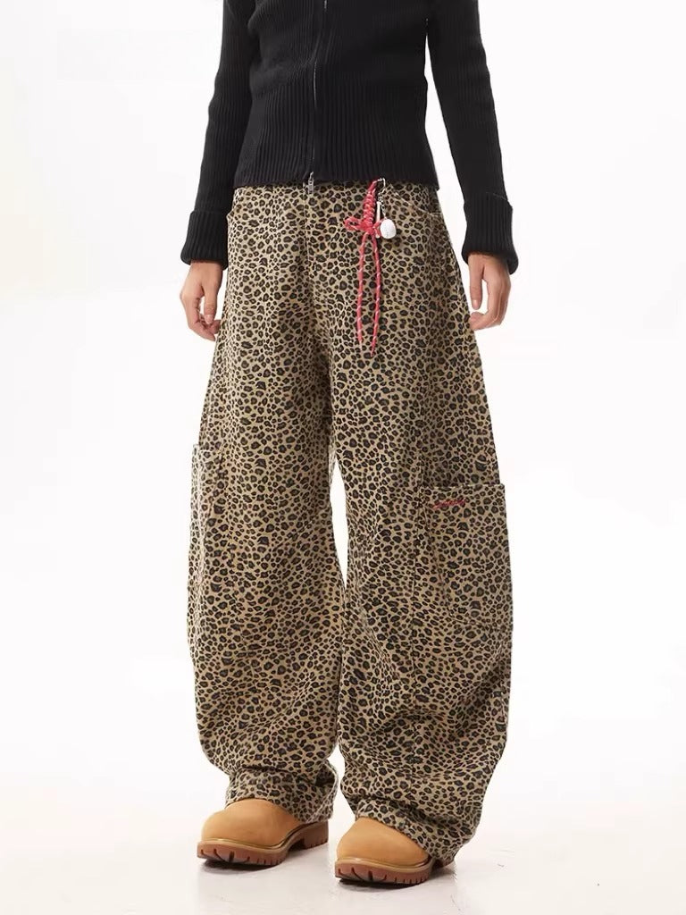 Unisex Leopard Print Statement Wide-Leg Scimitar Pants — worn by a model