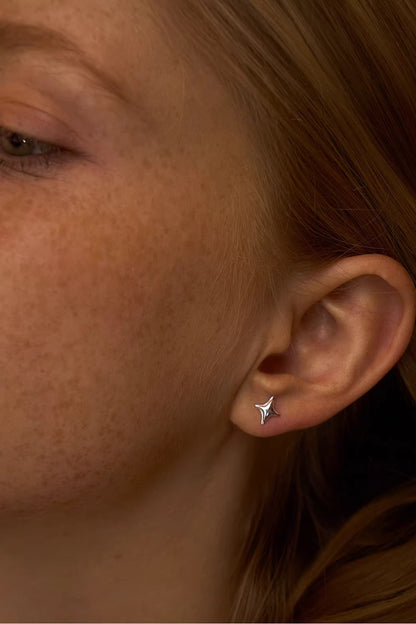 Asymmetric Double Star Earrings & Ring — worn by a model