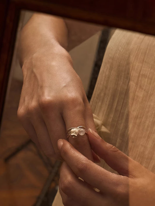 Twin Bell Ring & Crystal Teardrop Ring — worn by a model