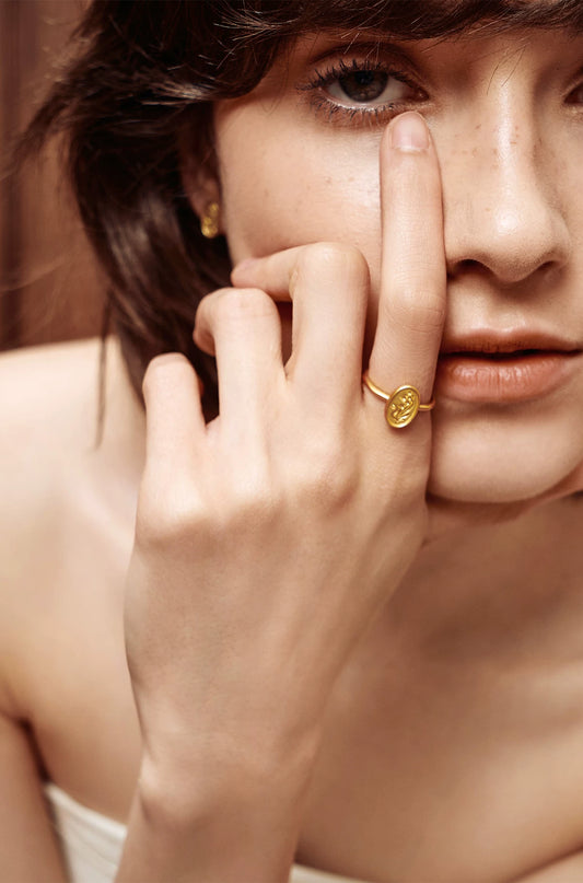 Oval Retro Relief Jewelry Set: Ring & Stud Earrings — worn by a model