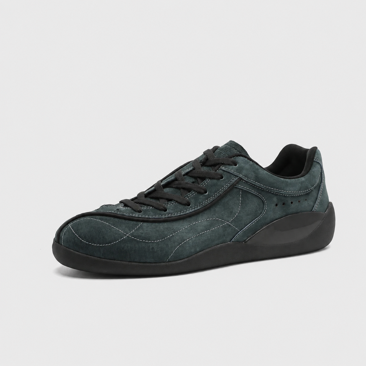 Navy faux suede panelled low-top sneaker with black laces and sculpted rubber sole
