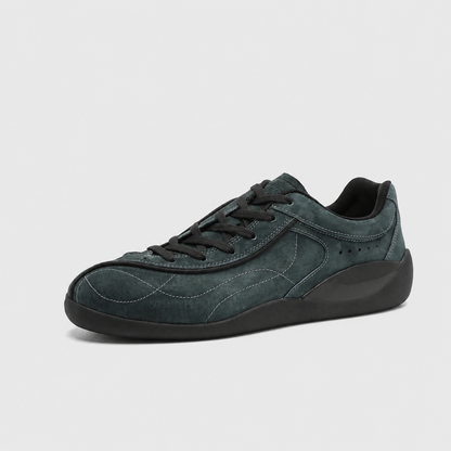 Navy faux suede panelled low-top sneaker with black laces and sculpted rubber sole