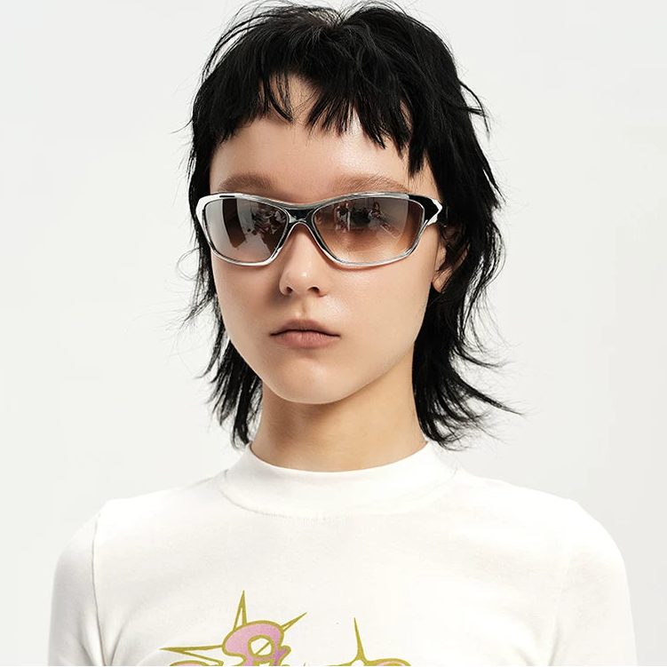 Futuristic Angular Sunglasses — Model wearing silver sunglasses with white tee