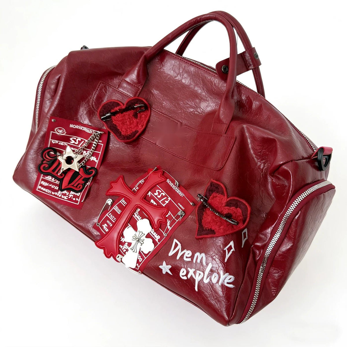Wine red heart patch duffle bag angled view