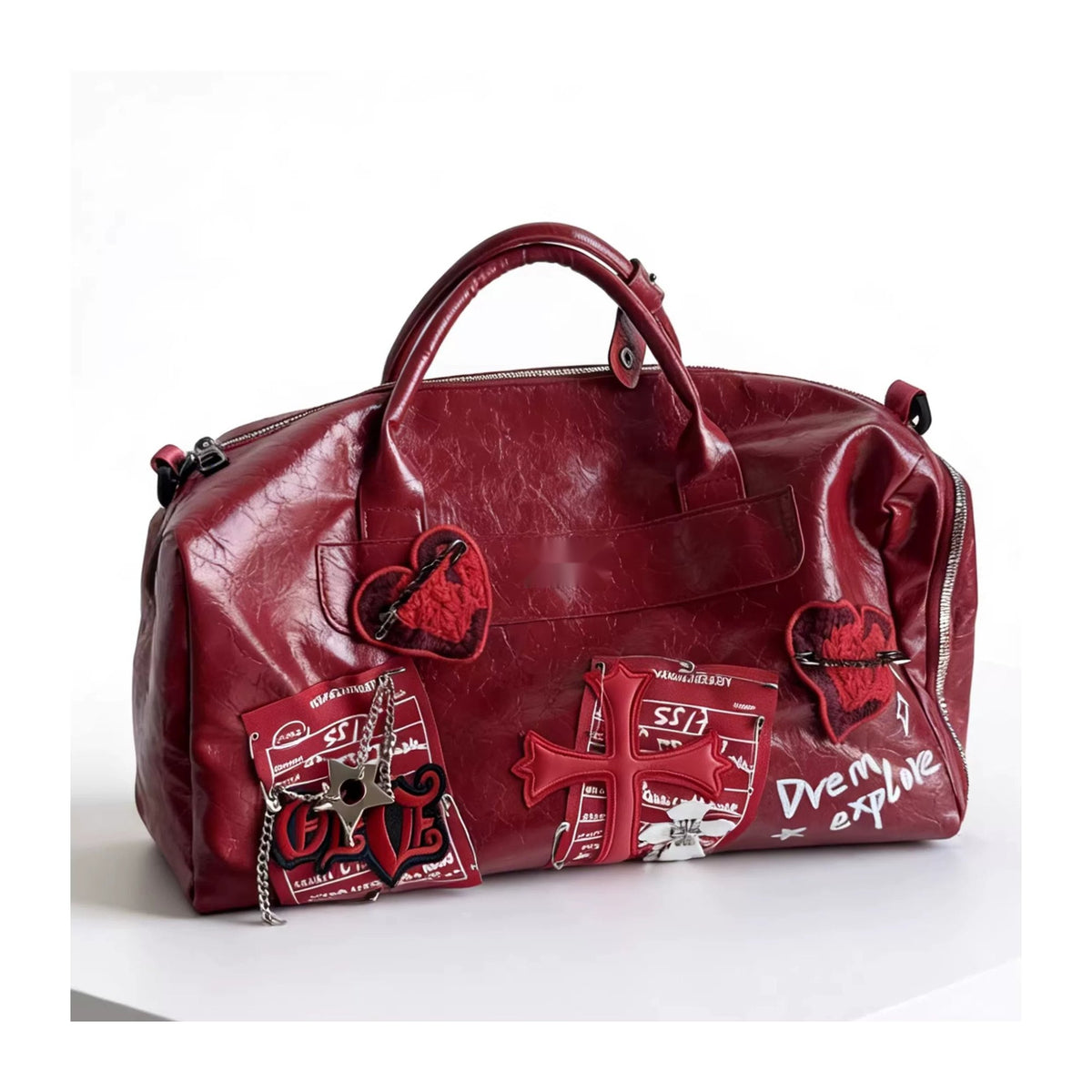 Wine red heart patch duffle bag front detail