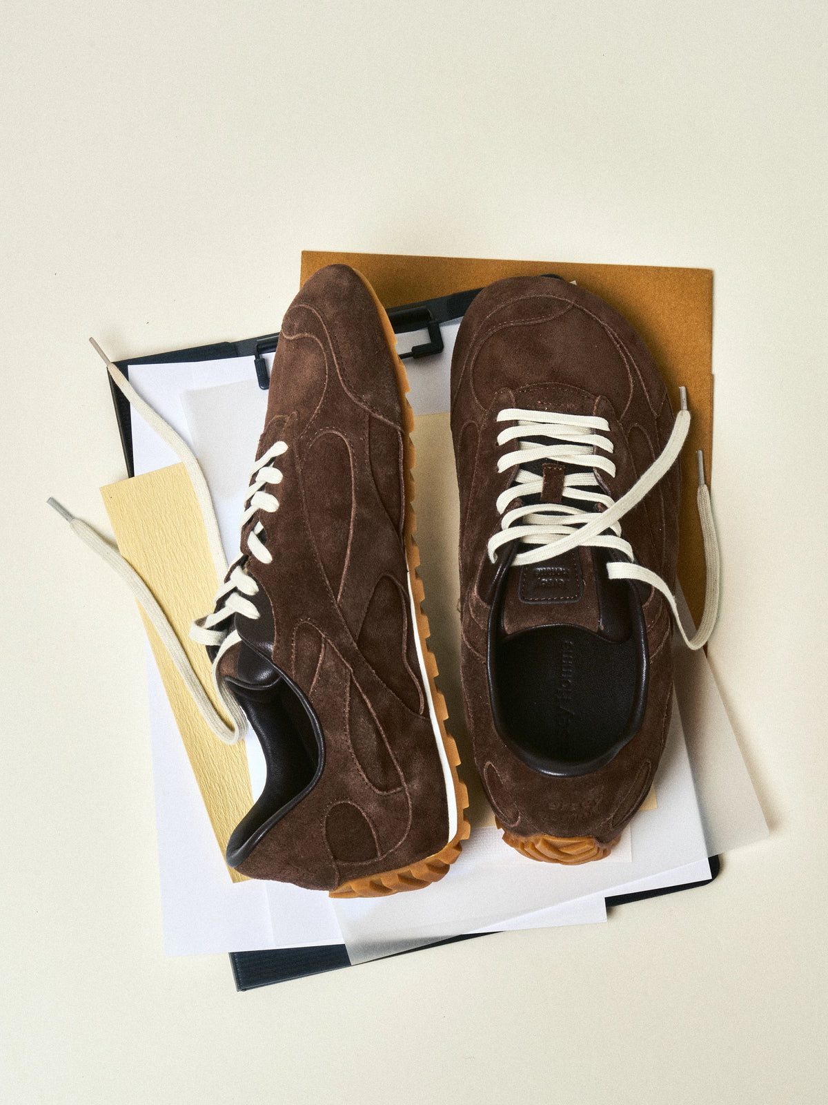 Italian Suede Wide-Fit German Trainer Sneakers — brown pair on wooden chair