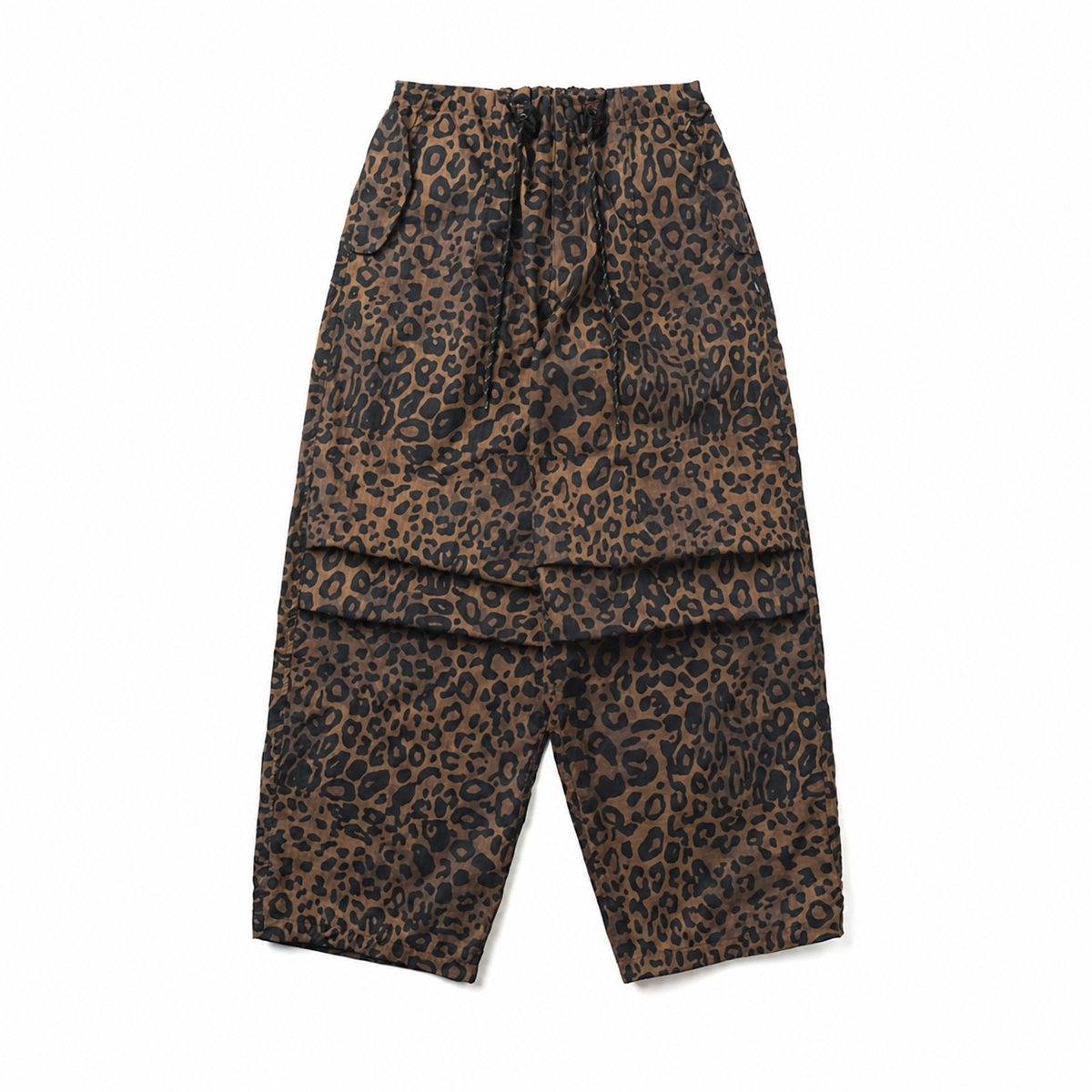 Brown leopard print parachute pants with pleated knees and drawstring waist
