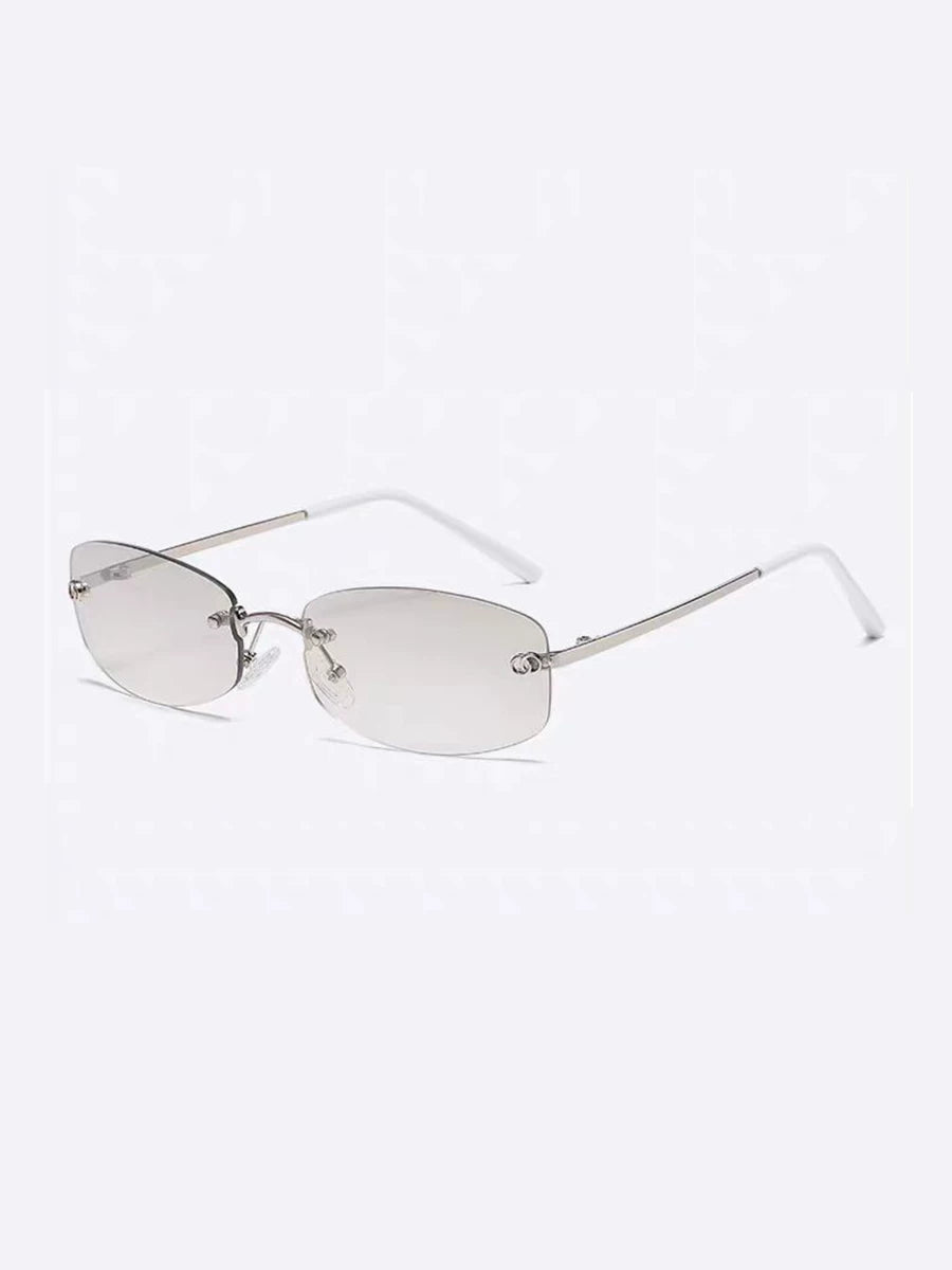 Lunettes de soleil rectangulaires sans monture en métal — coloris gris ; détails de la monture et des verres