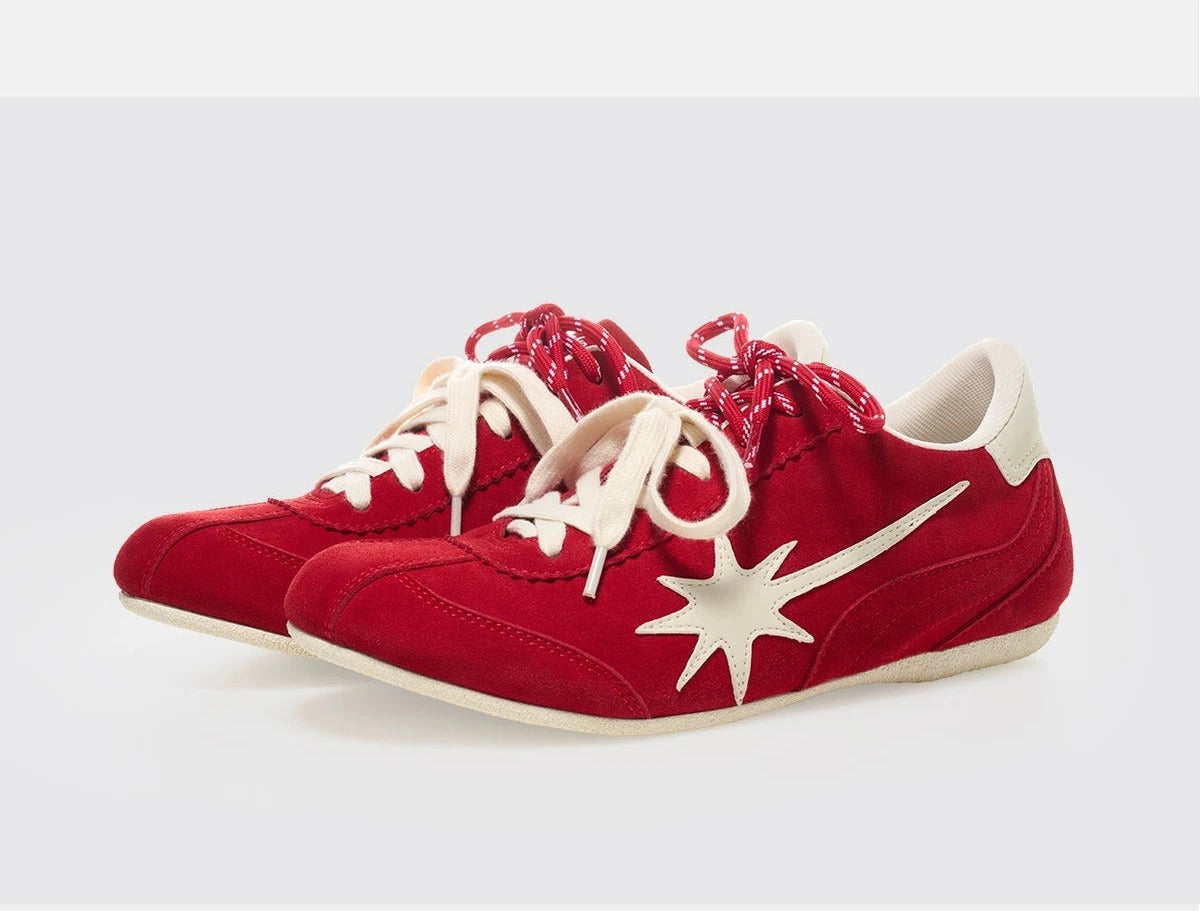 red training shoes pair side