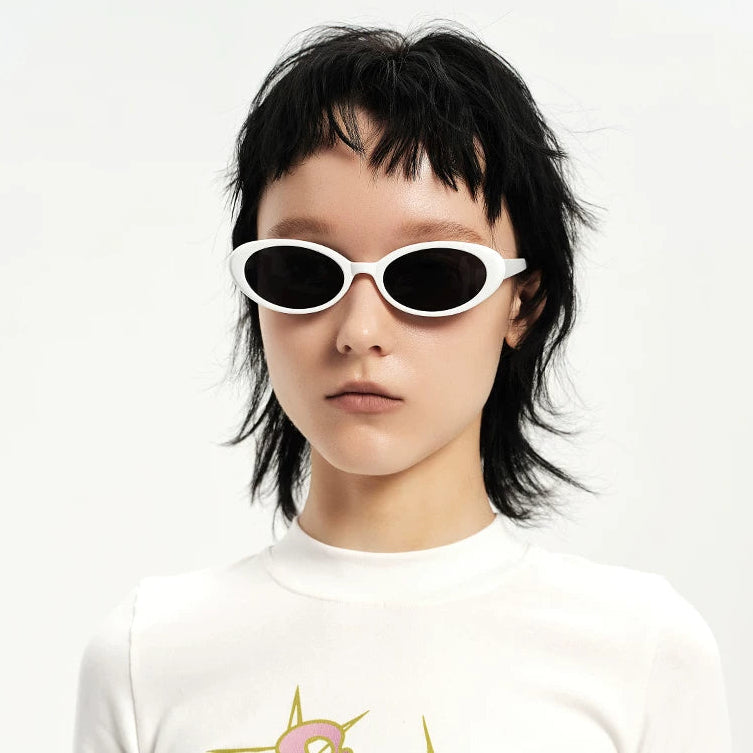 Retro Small-Oval Sunglasses — Model wearing white oval sunglasses