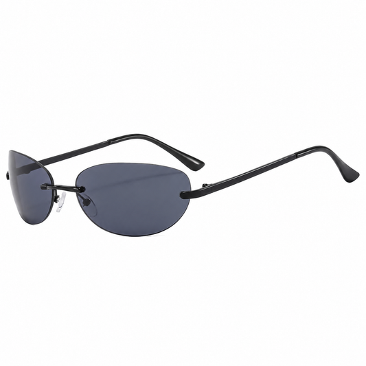 Angled view of rimless sunglasses with dark grey lenses and black bridge and temples on a white background.