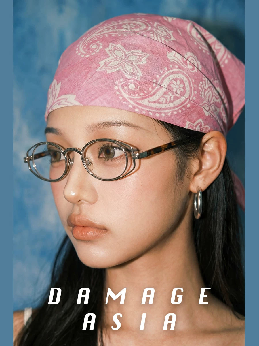 Round Metal Clear-Lens Glasses — Model wearing round clear-lens metal glasses with pink bandana